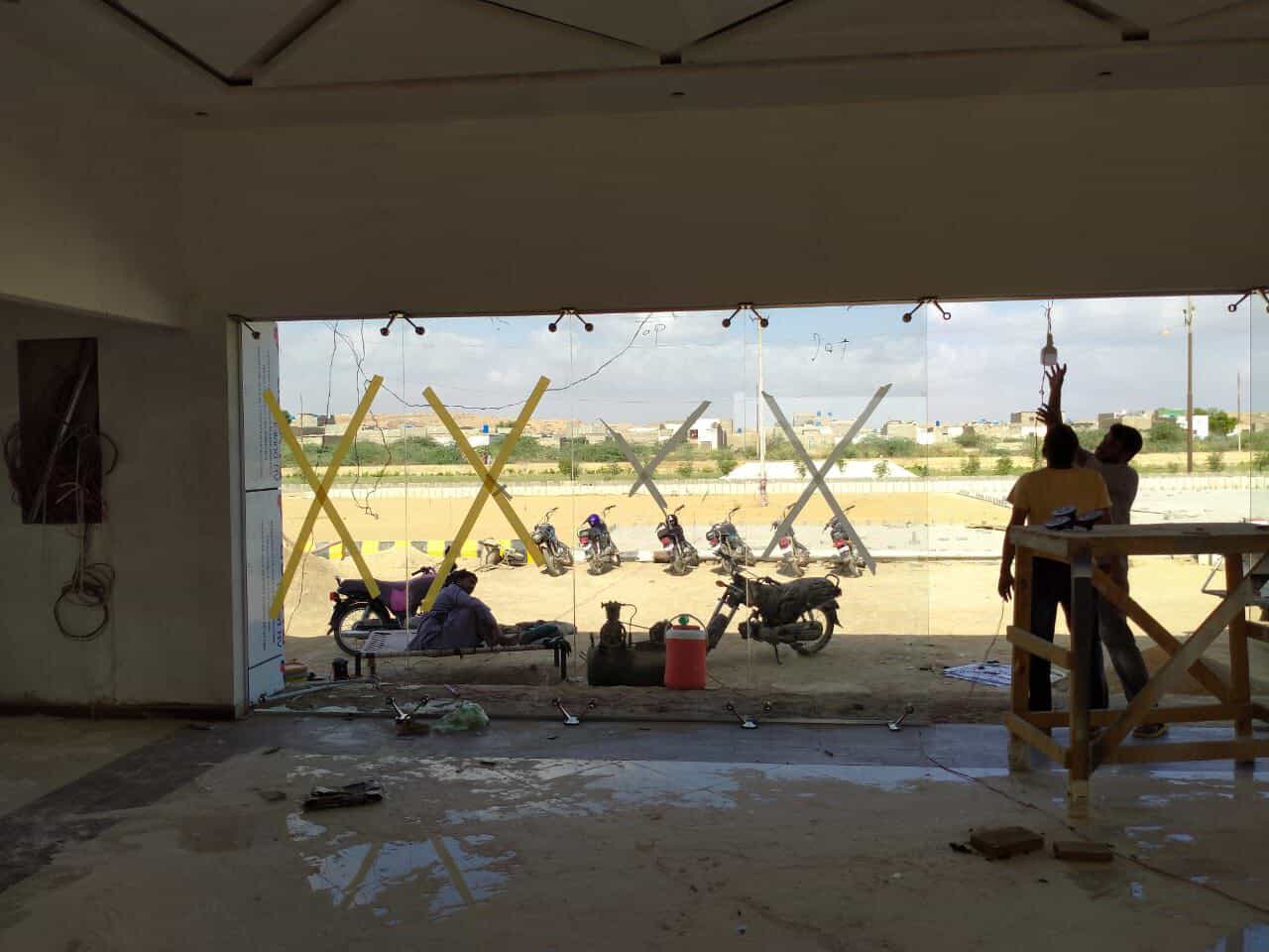 Spider glass panel fitting installation process